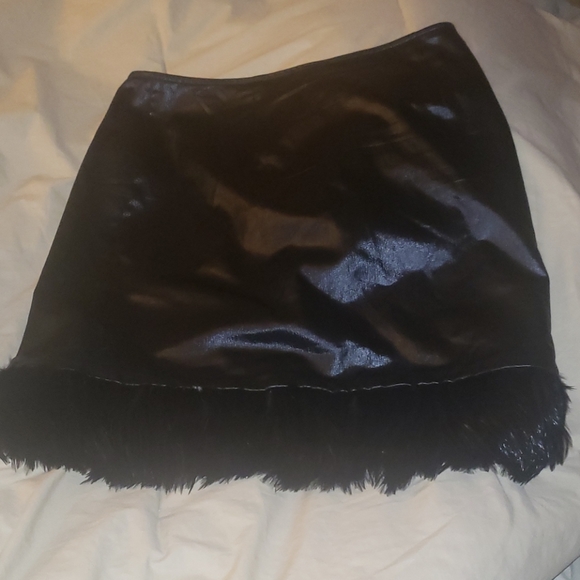 Cache shimmery skirt with feathers - Picture 5 of 5